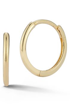 Sleek, tubular huggie hoops shaped from gleaming 14-karat-gold with minimal detailing offer a refined appearance for everyday wear. 3/8" hoop diameter Hinge with snap-post closure 14k gold Made in Turkey Classic Stackable Huggie Earrings, Classic Small Hoop Stackable Huggie Earrings, Classic Small Stackable Hoop Earrings, Classic Stackable Hoop Huggie Earrings, Classic Yellow Gold Stackable Huggie Earrings, Modern 14k Gold Filled Tarnish-resistant Huggie Earrings, Gold 14k Gold-filled Pierced Hoop Earrings, Elegant 14k Gold-filled Hoop Earrings For Pierced Ears, Modern 14k Gold-filled Pierced Hoop Earrings