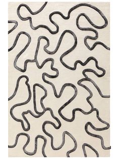 an abstract rug with black and white shapes on it's surface, in the shape of wavy lines