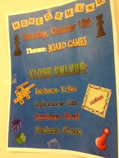 a poster on the wall that says home coming, thre board games class colors