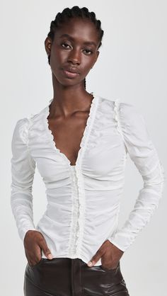 Fast Free Shipping & Free Returns on A.L.C. Beckett Top at Shopbop. Shop new arrivals from A.L.C. at Shopbop.com Ruched Fitted Blouse, Fitted Evening Top With Ruched Sides, Fitted Tops With Ruched Sides For Evening, Evening Fitted Top With Gathered Sleeves, Fitted Evening Tops With Gathered Sleeves, Fitted Tops With Gathered Sleeves For Evening, Night Out Fitted Blouse With Ruched Detail, Stretch Blouse With Gathered Sleeves, Fitted Tops With Gathered Sleeves