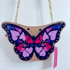 Gorgeous Sparkly And Jeweled Butterfly Cutout Crossbody Purse From Betsey Johnson. Brand New With Tags. Gold Toned Metal Chain Detail To Strap. Zipper Closure. Butterfly Purse, Hot Pink Bag With Butterfly, Betsey Johnson Purses Handbags, Betsy Johnson Phone Bag, Betsy Johnson Purses Handbags, Butterfly Cutout, Betsey Johnson Handbags, Betsey Johnson Wallet, White Crossbody Bag