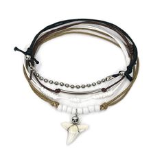 White Shark Tooth Bracelet with sleek white cord and shark tooth charm. Tooth Bracelet, Tooth Charm, Bracelet Pack, Beachy Style, Detailed Jewelry, Bold Accessories, Ocean Vibes