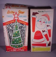 two boxes of tinsel christmas tree decorations