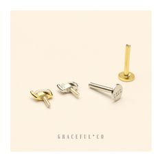 two pairs of gold and silver cufflinks on a white background with the words graceful - co written below them