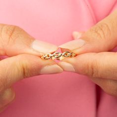 Our 14K Solid Gold Chain Link Ring is an embodiment of sophistication and contemporary style. Boasting a bold chain link design with a thickness of 3.30 mm, this ring is a statement piece that complements any ensemble. Whether you choose the classic elegance of Gold, the soft hue of Rose Gold, or the sleek finish of White Gold, this ring adapts to your unique style. Its intricate design captures the essence of versatility, making it a perfect accessory for both casual and formal occasions. Key Features: Bold Design: Features a striking chain link pattern, offering a blend of modern style and classic elegance. Versatile Style: Available in Gold, Rose Gold, and White Gold, suitable for various fashion statements and occasions. Premium Quality: Crafted from high-quality 14K solid gold, ensuri Chain Link Ring As Gift, Link Chain Ring Gift, Modern Yellow Gold Chain Ring For Promise, Elegant Link Chain Promise Ring, Adjustable Modern Ring, Gold Chain Link Ring As Gift, Yellow Gold Chain Ring As A Gift, Gold Oval Link Chain Ring, Elegant Chain Ring As Gift