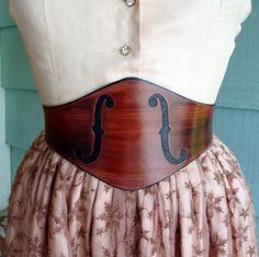 The MUSE Tooled Leather Wide Mahogany Violin F-holes Belt by ContrivedtoCharm on Etsy https://www.etsy.com/listing/61252130/the-muse-tooled-leather-wide-mahogany Cincher Belt, Tan Jeans, Corset Belt, Waist Cincher, Fashion Board, Music Lessons, Boho Stil, Story Ideas, Classical Music