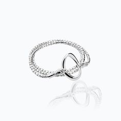 The Snake Bracelet from the Animal´s Collection by TANE is made in silver .925. With an extension of 21", the piece allows to wrap the wrist three times, achieving a final measure of 7" in diameter, thanks to its round chain that replicates the texture of a snake. At both ends, the piece is finished off with masterfully sculpted snake heads, which hold the representative link of the collection. Handmade in Mexico. TANE, the Mexican luxury brand founded in 1942, once again innovates to surprise i Mexican Luxury, Snake Heads, Snake Bracelet, A Snake, The Snake, Sterling Silver Bracelet, Bracelet Sizes, Badger, Luxury Brand