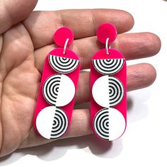 Channel your inner retro diva with these earrings inspired by the iconic Go-Go era. The lively colors and swinging design capture the spirit of fun. Created in hot pink and white acrylic, these earrings are 2 7/8" tall, the dangle is 2 1/4" long. They have stainless steel ear posts. Retro Multicolor Earrings For Parties, Retro Pink Party Earrings, Handmade Retro Pink Earrings, Summer Novelty Multicolor Earrings, Go Go Girl, Playful Pink Plastic Earrings, Acrylic Jewellery, Setting Spray, Girls Earrings