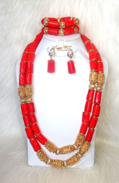 Traditional Real Coral 2 layer African Nigerian Beads Party Wedding Jewelry set Complete Set is Necklace Earring and bracelet Wedding Party Bridal Special Occasion This detailed Jewellery set makes you stand out elegantly in any special occassion, it's all about glamour and uniqueness.  Buying more that 1 Jewellery set, we offer wholesale and bulk prices for all our jewellery. Gold Faceted Beads Jewelry Set For Wedding, Red Spacer Beads Jewelry For Wedding, Red Round Beaded Bracelets For Wedding, Red Beaded Bracelets With Round Beads For Wedding, Elegant Beaded Bracelets With Large Beads For Wedding, Gold Beaded Bracelets For Wedding With Large Beads, Adjustable Large Beads For Weddings, Nigerian Beads, Pink Jewelry Set