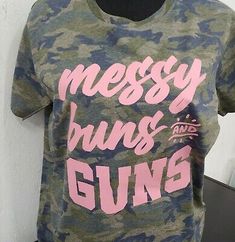 Ladies Messy Buns and Guns Camo T Shirt Round Neck Size X LArge | eBay Girl Camo, Camouflage Cotton T-shirt With Sublimation Print, Camouflage Cotton Top With Sublimation Print, Camouflage Cotton T-shirt With Letter Print, Camouflage Cotton Top With Letter Print, Summer Camouflage Cotton T-shirt, Trendy Camouflage Crew Neck T-shirt, Womens Camo, Camo Outfits