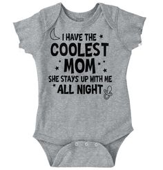 a baby bodysuit that says i have the coolest mom she stays up with me all night