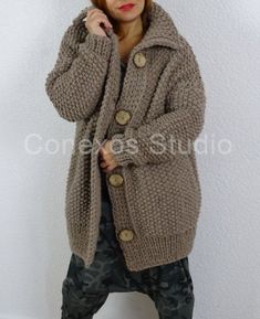 Bulky knit comfy casual oversized long cardigan.Very soft, warm, cozy and pleasant for skin.Easy to clean and practical to wear. Suitable to any outfit for different occasions.Practical and convenient.Great addition to your everyday clothing.Color: Beige (619)Material: 65% Wool, 35% AlpacaA soft and chunky blend of alpaca and wool MADE TO ORDER!!!It takes 3-4 weeks before item is made and ready to ship!Measurements:length 75 cm (29.5 '')width 60 cm (23.6 '')*** In picture knitted product is demo Long Oversized Cardigan, Bulky Knit, Everyday Clothing, Oversized Knitted Sweaters, Loose Knit, Jumper Sweater, Comfy Casual, Long Cardigan, Cotton Sweater