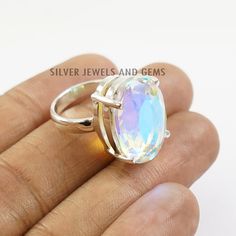 Iridescent Oval Spiritual Rings, Spiritual Iridescent Oval Rings, Iridescent Oval Jewelry For Anniversary, Iridescent Oval Jewelry For Anniversaries, Iridescent Oval Rings For Gifts, Iridescent Oval Sterling Silver Rings, Iridescent Oval Crystal Ring As Gift, Iridescent Oval Crystal Ring Gift, Iridescent Oval Crystal Ring For Gift