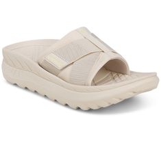 Ahhh, sweet relief. That's what you'll get when you slip your tired tootsies into these unisex recovery sandals. The sporty slides feature a soft neoprene upper with an adjustable hook-and-loop cross strap and a cushioned lining for maximum comfort and support.  Offering a fashion-forward take on recovery footwear, these shoes pair well with your casual and athleisure looks. Wear them after a low-impact workout, while you're walking the dog, or when you're padding around the house on a lazy Sund Lightweight Breathable Slides For Comfort, Comfortable Lightweight Breathable Slides, Comfortable Slide Sport Sandals For Outdoor Activities, Comfortable Outdoor Sport Slide Sandals, Comfortable Lightweight Slides For Outdoor, Comfortable Breathable Slides For Sports, Comfortable Lightweight Outdoor Slides, Sporty Synthetic Slides, Comfortable Breathable Slide Sport Sandals