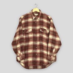 Vintage 90s Adamson Plaid Shadow Checkered Flannel Shirt Large Japanese Tartan Checked Shirt Japan Flannel Acrylic Work Button Shirt Size L Good Used Condition. No Stains and No Holes. Size (On Tag) : Size L **To make sure if it FITS YOU, refer at the exact measurements. Size Measurement (All measurements were taken lying flat) : Width [armpit to armpit] : 22.5 inches / 57 cm Length [shoulder to end of garment] : 31 inches / 79 cm THIS IS USED CLOTHING! PLEASE DON`T EXPECTED IT TO BE LIKE NEW OR Classic Brown Flannel Shirt With Button Closure, Classic Brown Flannel Shirt With Buttons, Brown Spread Collar Shirt For Winter, Retro Collared Flannel Shirt With Button Closure, Retro Plaid Flannel Shirt With Buttons, Retro Button-up Winter Shirt, Vintage Plaid Flannel Shirt For Fall, Vintage Collared Flannel Shirt With Button Closure, Vintage Collared Flannel Shirt With Buttons