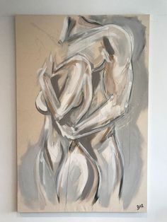 an abstract painting with white and grey colors on the wall above it is a woman's torso