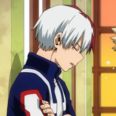 an anime character with white hair wearing a blue and red jacket looking off to the side