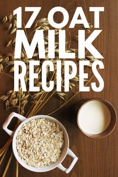 a bowl of oatmeal next to a cup of milk on top of a wooden table