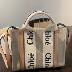 Wore Once / Basically Brand New / Excellent Condition High-end Beige Satchel For Errands, High-end Beige Shoulder Bag For Shopping, High-end Beige Satchel With Large Capacity, High-end Beige Tote Shoulder Bag, High-end Large Capacity Beige Satchel, Designer Beige Shoulder Bag For Errands, Luxury Neutral Tote Shoulder Bag, Luxury Neutral Tote Bag, Designer Neutral Top Handle Bag