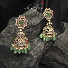 Silver Moissanite Polki Hydro Emerald Tumble Jhumka, Polki Kundan Earring, Indian Wedding Jewelery, Silver Polki Jhumki, Big Jhumka, Earring Material : Silver Gemstone: Moissanite, Hydro Emerald Tumble , Swarovski Stones Stone colour: Uncut Polki Primary colour: Gold Size-Length: 55mm Width: 25mm Closure : Screw back and Clips Silver Intricate, hand crafted, Pure Silver Polki Earrings, studded with high quality Moissanite Polki Earring comes with screw back and clips, made in 92.5 silver with 22 Fusion Style Dangle Jhumkas For Wedding, Temple Style Hand Set Dangle Jhumkas, Heavy Fusion Jhumkas For Wedding, Green Tilla Jhumkas For Ceremonial Occasions, Ceremonial Green Jhumkas With Tilla Detailing, Ceremonial Green Tilla Jhumkas, Green Earrings For Reception And Festivals, Fusion Style Intricate Design Dangle Jhumkas, Fusion Chandbali Jhumkas For Reception