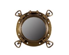 an antique brass porthole mirror with hearts on the sides and rivets around it