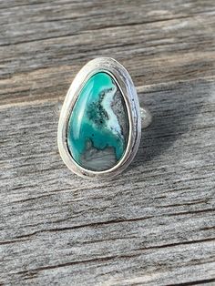 "This gorgeous mystic sage turquoise and variscite stone is settled into a simple sterling silver setting. This stone is so amazing and it didn't need much, as it speaks for itself! Ring size is 5 1/4\". All handmade jewelry will have natural imperfections, and honestly thats what gives each piece their alluring details, originality and soulful nature. Because of this, my pieces are created to be as unique as you are, with no two exactly alike. Please check out my Instagram for videos and pictur Spiritual Sterling Silver Turquoise Ring With Large Stone, Bohemian Chrysoprase Turquoise Ring, Bohemian Turquoise Chrysoprase Ring, Healing Sterling Silver Turquoise Ring, Sterling Silver Turquoise Ring For Healing With Natural Stones, Southwestern Chrysocolla Turquoise Ring, Southwestern Turquoise Chrysocolla Ring, Spiritual Sterling Silver Turquoise Ring With Natural Stones, Spiritual Turquoise Ring With Natural Stones In Sterling Silver