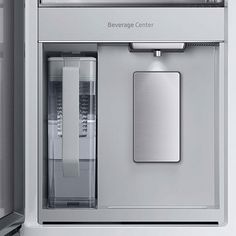 a refrigerator with the door open and its freezer in it's side view