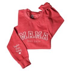 PRICES MAY VARY. 🎨Stand out with personalized style: Custom embroidered sweatshirts and hoodies let you express yourself with unique designs that reflect your personality. ⚒️Quality meets customization: Made from premium materials and expertly embroidered, our sweatshirts and hoodies ensure both comfort and durability, while showcasing your chosen design flawlessly. 🎁Perfect gift idea: Whether it's for a friend, family member, or even yourself, a custom embroidered sweatshirt and hoodies adds Mama Embroidered Sweatshirt, Custom Embroidered Sweatshirt, Sleeve For Women, Kids Names, Mama Gifts, Sweatshirts And Hoodies, Embroidered Sweatshirt, Embroidered Sweatshirts, Memorable Gifts