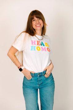 "Head Homo" screen-printed white shirt. Let the people know who the Head Homo in town is really is with this fun and colorful shirt. Pre-shrunk, soft washed, garment dyed fabric Designed and made in New Orleans Unisex sizing Size Chart: (in inches) S M L XL 2XL 3XL Sleeve Length 8 8 ¼ 9 9 ½ 9 ¾ 9 ¾ Full Body Length 27 28 ½ 30 31 ½ 32 ¾ 33 Body Width 18 ½ 20 ½ 22 ½ 24 ½ 26 ½ 28 Casual Pride Screen Print T-shirt, White Cotton Tops For Pride Festival, White Cotton Top For Pride, Pride Funny Print Cotton Top, Funny Print Cotton Top For Pride, Cotton Screen Print Tops For Pride, Casual Cotton T-shirt For Pride, Pride Cotton Graphic Tee, Cotton Graphic Tee For Pride Festival