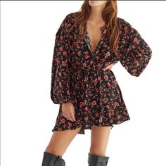 Contemporary From Free People, This Dress Features V-Neckline Long Sleeves Floral Print Front Button Closure Approx. 34.5" Length Rayon Machine Wash/Line Dry Color: Dark Combo Imported Flowy V-neck Floral Dress For Fall, Chic V-neck Floral Dress For Fall, Flowy Floral V-neck Dress For Fall, Long Sleeve Floral Dress For Fall Vacation, Long Sleeve Floral Beach Dress For Fall, Long Sleeve Floral Dress For Fall Beach Outing, Fall Floral Dress For Date Night, Fall Beach Mini Dress With Floral Print, Bohemian V-neck Floral Dress For Daywear