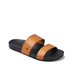 Reef-Cushioned Vista Sandal Keep it classic with the Cushioned Vista sandal from Reef. The simple silhouette features a slide silhouette that makes it easy to slip on if you're heading to the beach or the pool. Complete with a trendy double strap design for a fashionable flair. Beach Open Toe Slides With Arch Support, Beach Slides With Arch Support And Open Toe, Open Toe Beach Slides With Arch Support, Open Toe Slides With Arch Support For Beach, Adjustable Open Toe Sandals For Surfing, Comfortable Open Toe Sandals For Surfing, Open Toe Sandals For Surfing And Beach Season, Open Toe Sandals For Beach Season, Adjustable Sandals For Surfing In Summer