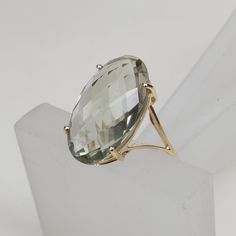 You can choose your own gem in my store. Let me know if you would like to see options Details of the ring Gem: Green Amethyst Gem size & shape: 20x12 mm and Oval Center Gem weight: 9.50 carat Gold purity: 14K (58.33% approx.) Gold weight: 1.35 grams total weight of ring: 3.25 grams Fine briolette cut Green Amethyst oval shape gemstone ring set in solid 14K yellow gold. The Gold purity is guaranteed and it comes with authentic 14 kt gold hallmark. Since these Rings are handmade, Size Customiz Elegant Faceted Amethyst Ring In Yellow Gold, Elegant Green Oval Amethyst Ring, Elegant Green Amethyst Ring For Formal Occasions, Luxury Green Amethyst Ring, Elegant Gold Ring With Green Amethyst, Elegant Gold Rings With Green Amethyst, Gold Green Amethyst Ring For Formal Occasions, Formal Gold Amethyst Ring With Green Stone, Formal Green Amethyst Ring In Gold