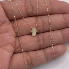 A Beautiful Jewelry That Is Made Of Authentic 100% 14k Karat Real Gold (Color: Yellow Gold ) That Is Not Plated/Filled. It Will Not Tarnish Or Fade Overtime And Will Last You A Lifetime To Enjoy. It Is Stamped 14k For Authenticity. 16-18 Inches Its Shiny And Unique. Please See All Pictures For Dimensions. It Comes With A Gift Box Available Okay . Hamsa Necklace, Real Gold, Womens Jewelry Necklace, Gold Diamond, Beautiful Jewelry, Gold Color, Gift Box, Jewelry Necklaces, Yellow Gold