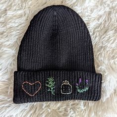 Practical Magic Hand Embroidered Adult Beanie Hat Witch Herbs Embroidered Fitted Cap, Casual Fitted Embroidered Hat, Casual Beanie With Embroidered Logo, Black Embroidered Beanie For Winter, Embroidered Fitted Beanie Hat, Casual Embroidered Beanie For Winter, Casual Winter Hats With Custom Embroidery, Casual Embroidered Winter Beanie, Black Embroidered Beanie, One Size Fits Most