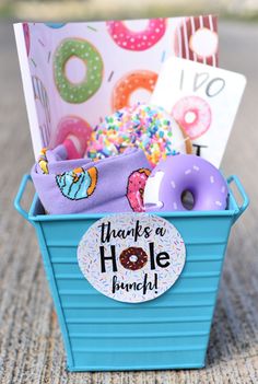 When you need a fun way to say thanks to a friend, this donut themed thank you gift idea is sure to make them smile! Whether you fill up a basket with fun donut themed items or just add this cute gift tag to a box of donuts, this gift is fun to give and fun to receive! Works great for a teacher gift too! #teachergift #giftidea #teacherappreciation Donut Gift Ideas, Candy Bar Gifts, Donut Gifts, Fun Christmas Party Games, Cricket Ideas, Appreciation Ideas, Christmas Gift Card Holders, Boss Men, Bar Gift