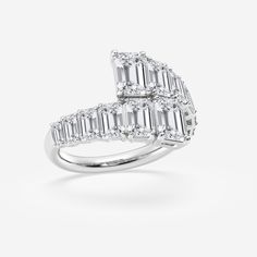 an engagement ring with baguettes and diamonds