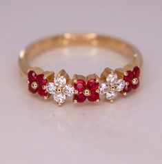 Luxury Ruby Flower Ring In Fine Jewelry Style, Luxury Ruby Flower Ring Fine Jewelry, Ruby Ring Designs, Ruby Wedding Band, Ladies Rings, Fancy Jewelry Necklace, Ruby Wedding, Flower Band, Gold Rings Fashion