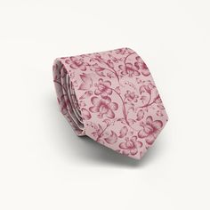 This elegant printed tie features a whimsical hand-drawn floral pattern in light burgundy color over a blush pink background. Makes a great wedding tie for groom or groomsmen that may coordinate well with David's Bridal Cameo, Blush Pink, or Chianti bridesmaid dresses. Please note that a 100% match to your bridal colors cannot be guaranteed with sublimation printed ties.✦✦✦ READ THIS BEFORE YOU ORDER - COLORS, RETURNS, SHIPPING... ✦✦✦Go to my shop's main page and click on the link under the head Groomsmen Pink Tie, Pink Fitted Standard Tie, Elegant Pink Floral Print Tie, Chianti Bridesmaid Dresses, Chianti Wedding, Bridal Colors, Light Burgundy, Groomsmen Ties, Wedding Tie