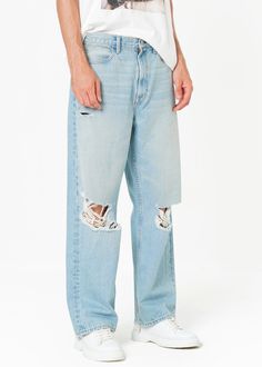 An archetypal, loose-fitting design that clings lightly to the hips and thighs, flowing into a luxuriously voluminous, straight-legged look - a style beloved by '90s and early 2000's skate, hip-hop, and rave cliques, now made contemporary - powerful rigid denim featuring a softly-distressed indigo wash with retro-infused rips at the knees. Approximate Rise: 12.75" Inseam 30" Approximate Knee: 21.5" Leg opening: 20.75" Weight 13.75 oz denim 100% Cotton Made in USA Loose Jeans, Independent Designers Fashion, Coat Dress, New Product, Jacket Dress, Blazer Jacket, Mens Shorts, Shirt Blouses, Knitwear