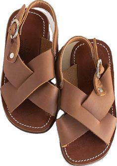 Cross strap, medium brown leather sandals for children. Unisex design. Adjustable Slingback Sandals With Round Toe, Adjustable Leather Slingback Sandals For Everyday, Brown Sandals With Soft Sole For Vacation, Adjustable Closed Toe Everyday Sandals, Adjustable Closed Toe Sandals For Everyday, Adjustable Brown Sandals For Everyday Wear, Adjustable Brown Sandals With Soft Sole, Leather Open Toe Sandals With Soft Sole, Brown Soft Sole Huarache Sandals For Summer