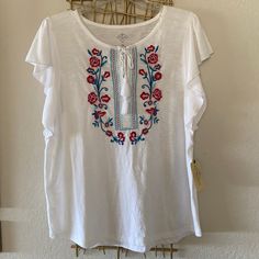 Soft Cotton Knit Top With Pretty Embroidery Design, Cute Flutter Sleeves... Ties At Neckline... Casual White Top With Floral Embroidery, White Casual Embroidered Top With Floral Print, Casual White Embroidered Top With Floral Print, White Casual Top With Floral Embroidery, White Bohemian Tops With Floral Embroidery, Casual White Embroidered Top, Spring Tops With Multicolor Embroidery And Embroidered Hem, Casual Cotton Top With Floral Embroidery, Casual Cotton Embroidered Top With Floral Print