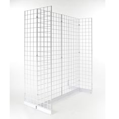 a white room divider with metal bars on the sides and one section closed up