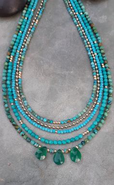 "Unique stucking beaded turquoise gemstone chocker/necklace Beaded turquoise necklace with faceted genuine turquoise beads and 3 green onyx teardrop beads  14k solid gold  beads and clasp. This turquoise necklace is dainty , you can wear it alone or layered with other necklaces Measures: *Turquoise beads - 3mm approx *Total necklace length - please select befor checkout 15\" - chocker 15.5\" 16\" - close to the neck  16.5\"- standard 17\" - looser *14k solid gold clasp - please select spring or Elegant Multi-strand Turquoise Gemstone Necklace, Turquoise Multi-strand Gemstone Necklaces, Turquoise Multi-strand Gemstone Necklace, Turquoise Gemstone Multi-strand Necklace, Elegant Turquoise Beaded Emerald Necklace, Turquoise Beaded Oval Beads Jewelry, Elegant Turquoise Beaded Necklaces With Oval Beads, Handmade Amazonite Round Bead Jewelry, Elegant Turquoise Beaded Necklace With Oval Beads