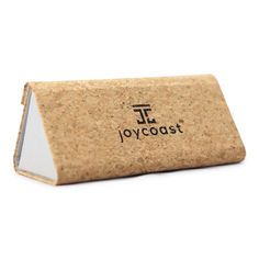 a cork business card holder with the word joycoast printed on it's front