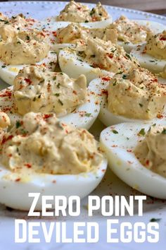 deviled eggs on a plate with the words zero point deviled eggs