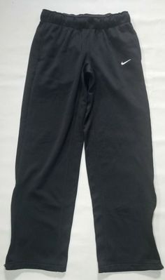 NIKE THERMA-FIT MEN'S ATHLETIC PANTS / SWEATPANTS SIZE: SMALL COLOR: BLACK UP FOR YOUR CONSIDERATION ARE A GREAT PAIR OF NIKE SWEATPANTS.  PANTS ARE IN EXCELLENT OVERALL CONDITION.  PANTS FEATURE HAND POCKETS, ELASTIC WAISTBAND w/ DRAWSTRING, AND ZIP UP OPEN HEM ANKLES. PLEASE SEE ALL PICS AND ASK ANY QUESTIONS PRIOR TO BUYING. THANK YOU FOR VISITING THROWBACK SPORTS APPAREL Nike Boys Track Pants, Nike Moisture-wicking Sweatpants For Gym, Nike Sweatpants For Workout With Moisture-wicking, Nike Stretch Sweatpants For Sports, Nike Moisture-wicking Sweatpants For Sports, Nike Sweatpants With Go-dry For Sports, Nike Black Moisture-wicking Sweatpants, Nike Go-dry Sweatpants For Sports, Nike Functional Sweatpants For Gym