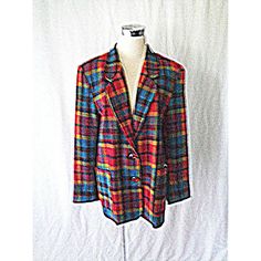 Vintage Limited Blazer Is Done In A Rich Plaid In Turquoise Green, Orange Red, And Yellow Colors. Jacket Has V Neck And Two Button Closure. Jacket Has Long Sleeves, And Two Good Size Pockets On Front. There Are Two Extra Buttons Attached To The Label. New With Tags. Size M Bust 40 Waist 42 Hips 44 Shoulder To Shoulder 18 Sleeves Length From Shoulder 24 Length 28 45% Polyester, 25% Wool, 25% Acrylic, 5% Other Lining: 100% Acetate Dry Clean Only Made In Usa Excellent Condition - New With Tags Tailored Multicolor Blazer For Fall, Multicolor Blazer For Formal Fall Occasions, Multicolor Formal Outerwear For Fall, Tailored Multicolor Formal Outerwear, Multicolor Formal Winter Blazer, Elegant Multicolor Winter Blazer, Fitted Multicolor Wool Outerwear, Formal Multicolor Winter Outerwear, Winter Formal Multicolor Outerwear