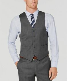 $215 Michael Kors 39L Men's Gray Blue Check Wool Classic Fit Suit Waistcoat Vest Description Embody the styling tastes of a true gentleman with the timeless appeal and magnificence of this three-piece gray check vest by Michael Kors. Matching its smart looks is the luxurious comfort offered by soft, natural stretch wool fabric. Vest: Five-button closure; two front pockets; half-back belt; fully lined Shell: wool; lining: polyester/viscose Dry clean Imported About Us We sell only 100% authentic c Classic Wool Vest For Office, Tailored Business Vest In Suiting Fabric, Tailored Vest In Suiting Fabric For Business, Sleeveless Business Suits, Tailored Business Vest With Suit Collar, Tailored Business Vest For Fall, Tailored Vest For Business In Fall, Formal Notch Lapel Vest For Winter, Tailored Business Vest With Welt Pockets