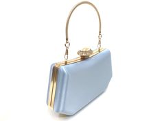 Evening bag made with handmade luxury baby blue satin and gold accessories. Perfect choice for wedding, dinner, cocktail, party and night parties etc... Suits any dress type. Perfect gift for bride, wife, mother, girlfriend, ladies. It will be a perfect piece that will complete your style. It is big enough to hold you things ( phone,  money, keys, cards, mini mirror, lipstick etc ). **SIZE - Width = 20 cm  /  7.8 inc - Height =  11 cm  /  4.3 inc - Depth = 5.5 cm  /  2.1 inc Shipping: You can have it in 3-4 days max. via UPS and FedEX Express to all over the world.   If you have any questions, please feel free to ask. Light Blue Rectangular Bag For Formal Occasions, Blue Party Bag With Pearl Handle, Elegant Light Blue Clutch For Evening, Light Blue Rectangular Evening Clutch, Elegant Light Blue Evening Clutch, Elegant Blue Bag With Pearl Handle, Elegant Light Blue Bags For Party, Elegant Light Blue Party Bags, Blue Clutch Bag For Wedding Guest