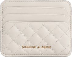 Chic Rectangular Card Holder With Card Slots, Chic Rectangular Card Holder, Chic Rfid Blocking Rectangular Card Holder, Chic Rectangular Card Holder With Rfid Blocking, Elegant Quilted Rectangular Wallet, Classic White Card Holder With Card Slots, Elegant White Rectangular Card Holder, Chic Cream Wallets, Beige Rectangular Card Holder For Formal Use